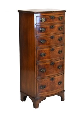 Lot 367 - Walnut bowfront six-drawer tallboy