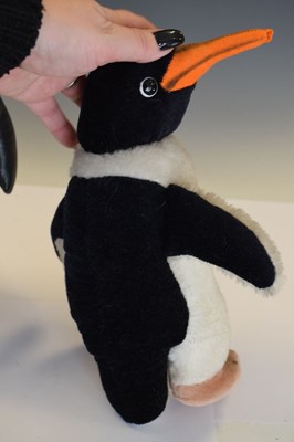 Lot 408 - Four Steiff penguins, Mole & Merrythought mole