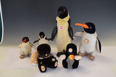 Lot 408 - Four Steiff penguins, Mole & Merrythought mole