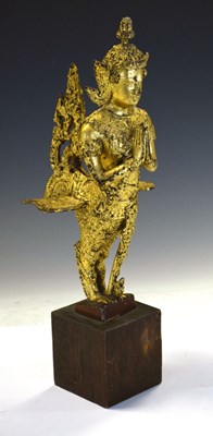 Lot 153 - South East Asian gilt metal sculpture