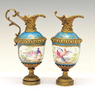 Lot 415 - Pair Sevres porcelain and ormolu ewers