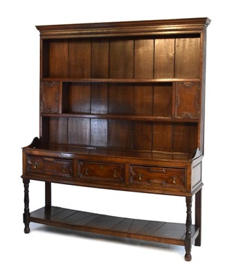 Lot 387 - 17th Century style oak dresser