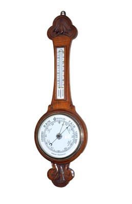 Lot 317 - Oak cased wheel aneroid barometer