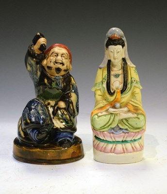Lot 297 - Japanese pottery figure of Daikoku