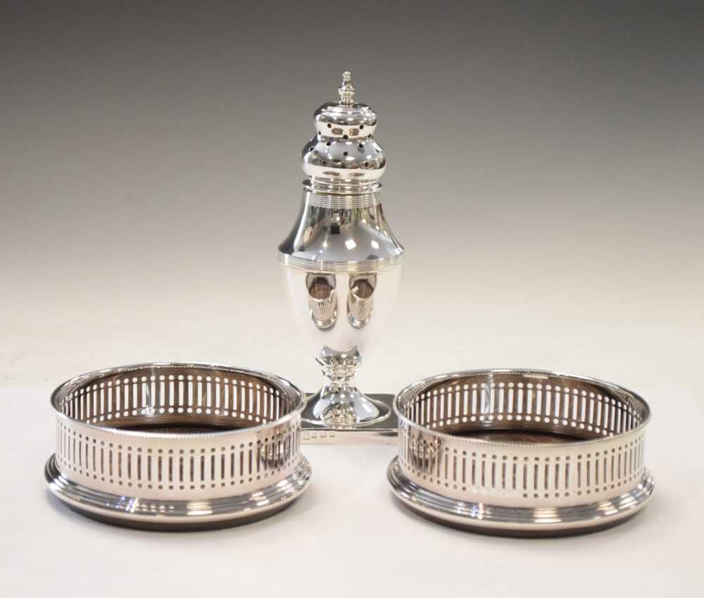 Lot 131 - Silver sugar sifter and pair of silver wine coasters