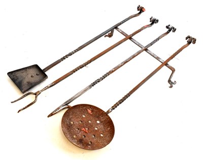 Lot 432 - Blacksmith made ram's head wrought iron companion set