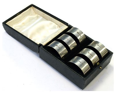 Lot 121 - Cases set of six late Victorian silver napkin rings