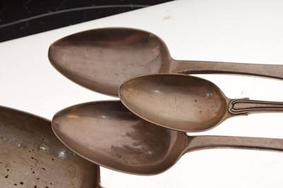 Lot 127 - Silver basting spoon, four dessert spoons, etc