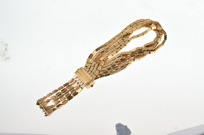 Lot 112 - 1950's yellow metal five strand bracelet