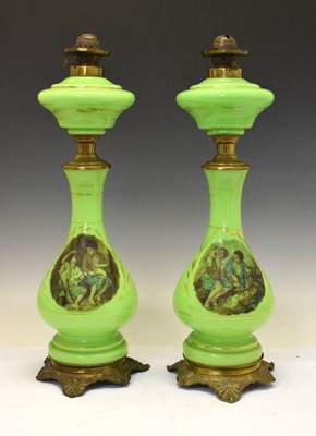 Lot 501 - Pair of green glass oil lamps