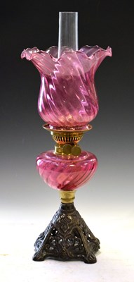 Lot 259 - Art Nouveau-style cranberry lamp