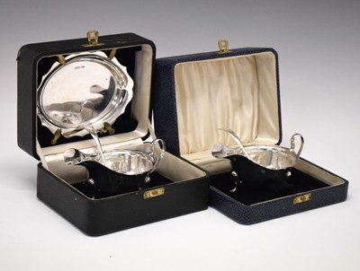 Lot 163 - Two cased silver sauceboats and ladle