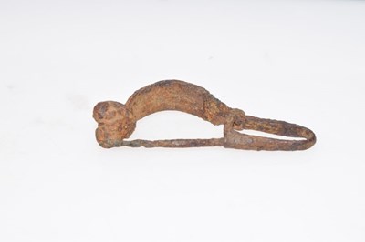 Lot 146 - Antiquities - Roman iron fibula or 'crossbow' brooch