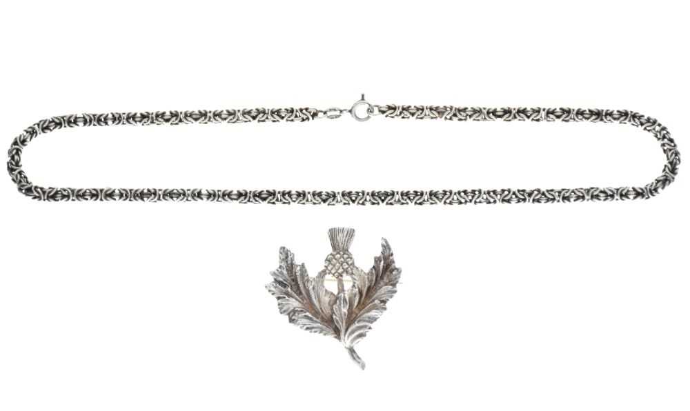 Lot 56 - Scottish silver thistle brooch, and a silver chain