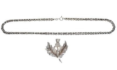 Lot 56 - Scottish silver thistle brooch, and a silver chain