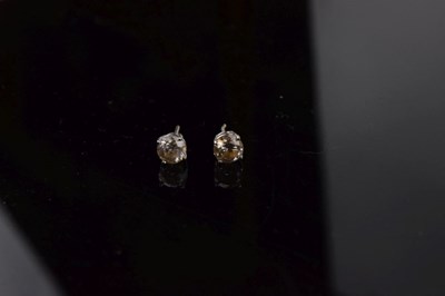 Lot 122 - Pair of single stone diamond ear studs