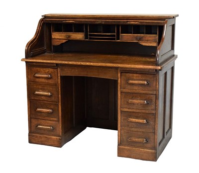 Lot 707 - Oak tambour-front desk and chair