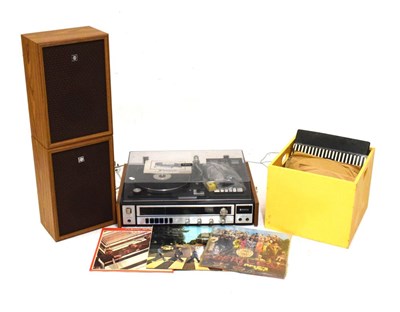 Lot 670 - Sanyo Model G2711 record player & speakers, together with a quantity of records