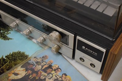 Lot 670 - Sanyo Model G2711 record player & speakers, together with a quantity of records