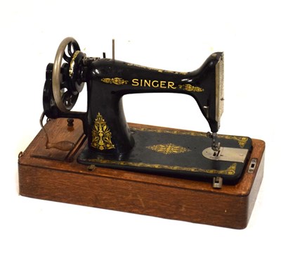 Lot 533 - Oak cased Singer sewing machine