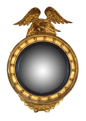 Lot 571 - Regency giltwood convex wall mirror