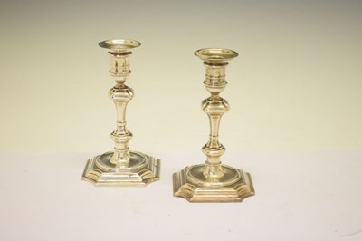 Lot 162 - Pair of George II silver candlesticks