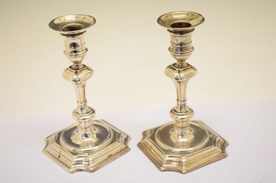 Lot 162 - Pair of George II silver candlesticks