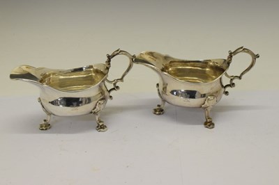 Lot 163 - Pair of George II silver sauce boats