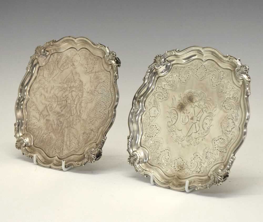 Lot 164 - Pair of George II silver waiters