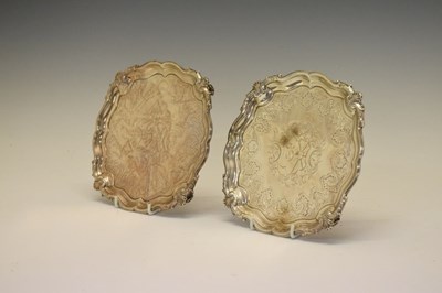 Lot 164 - Pair of George II silver waiters