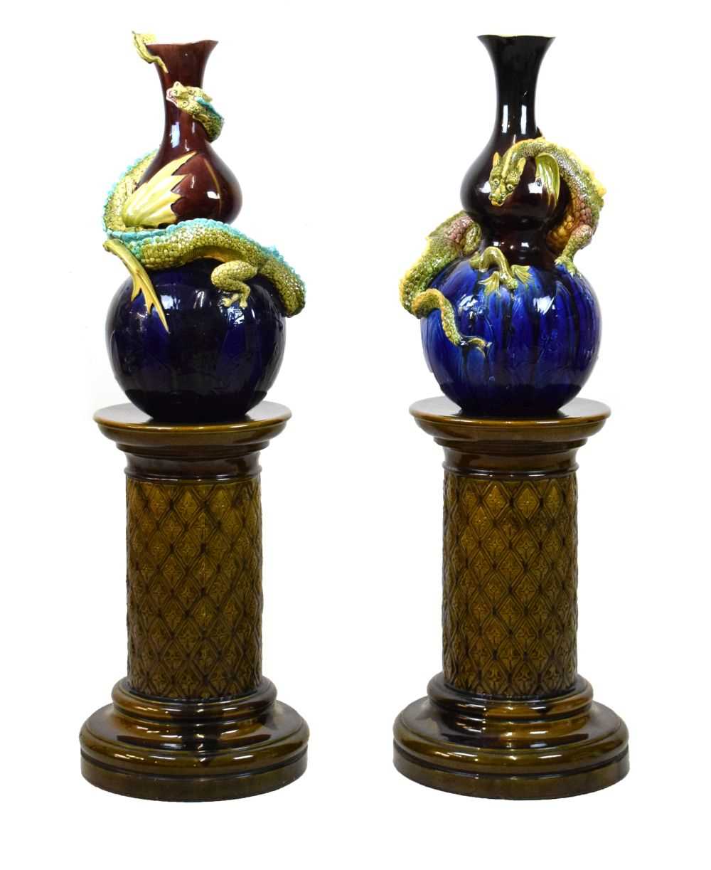 Lot 405 - Pair of Burmantofts dragon double gourd vases on pedestal bases