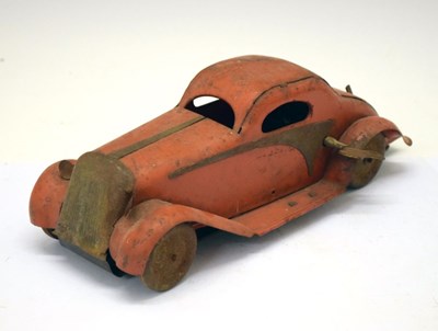 Lot 429 - Post Second World War tinplate clockwork racing car, stamped 'British Made'