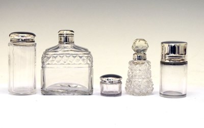 Lot 198 - Five various silver top dressing table bottles etc