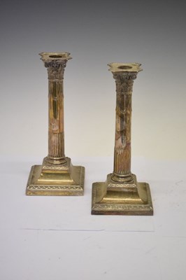Lot 198 - Pair of George V silver column candlesticks