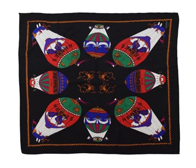 Lot 234 - Hermes, Paris, silk scarf, with hot air balloons and cherubs against a black ground