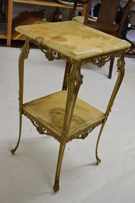 Lot 697 - Onyx and brass table