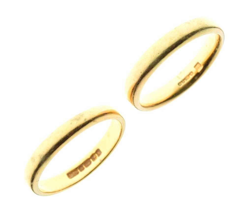 Lot 23 - Two 22ct gold wedding bands, sizes N and O½, 8.9g approx