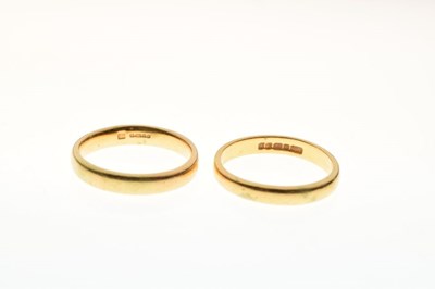 Lot 23 - Two 22ct gold wedding bands, sizes N and O½, 8.9g approx