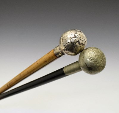 Lot 327 - Two swagger sticks/canes, having Fire Brigade and Constabulary crested white metal mounted tops