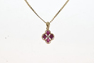 Lot 55 - 9ct gold, ruby and diamond quatrefoil pendant on a 9ct chain
