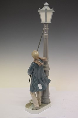 Lot 428 - Lladro porcelain figure - 'Lamplighter', 5205