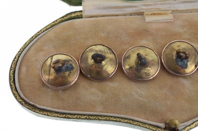 Lot 74 - Cased set of yellow metal portrait buttons