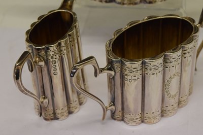 Lot 183 - Victorian silver bachelor's three-piece tea set of oval ribbed form