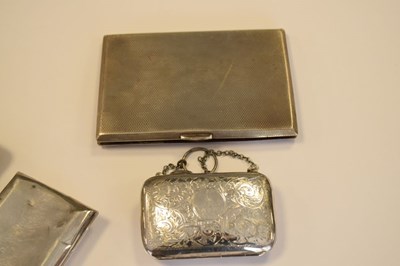 Lot 217 - Three various silver cigarette cases, together with a silver cased purse