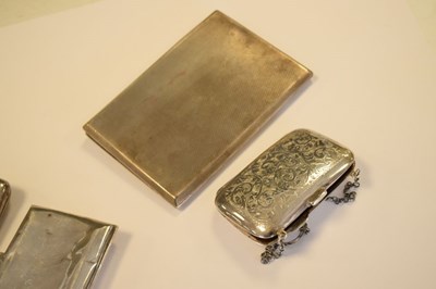 Lot 217 - Three various silver cigarette cases, together with a silver cased purse