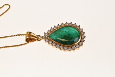 Lot 60 - Emerald and diamond cluster pendant on a chain