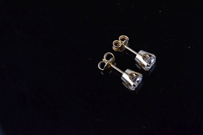 Lot 124 - Pair of single stone diamond ear studs