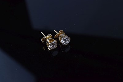 Lot 124 - Pair of single stone diamond ear studs