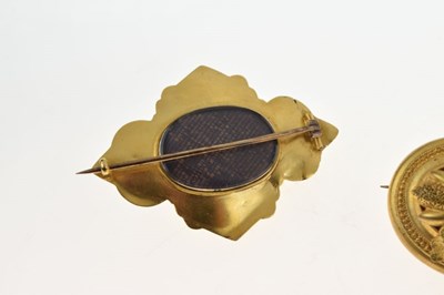 Lot 46 - Victorian yellow metal brooch, and two gilt metal brooches