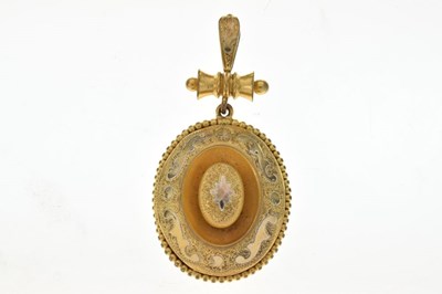 Lot 70 - Victorian gilt metal locket back pendant